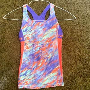 Girls sports tank from Ivivva with built in bra.